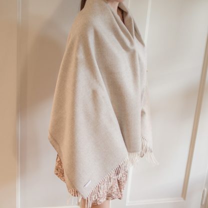 100% baby alpaca throw as a clothing