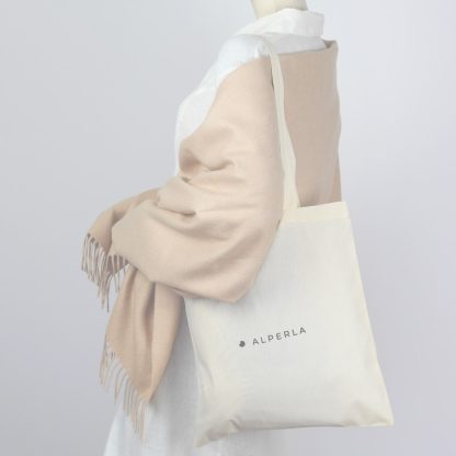 Alpaca wool throw as clothing