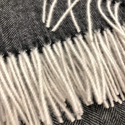 Anthracite herringbone alpaca blanket with ecru tassels