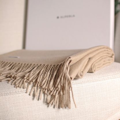 Beige alpaca blanket in a gift pack