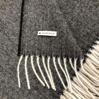 Black herringbone alpaca throw with fringes