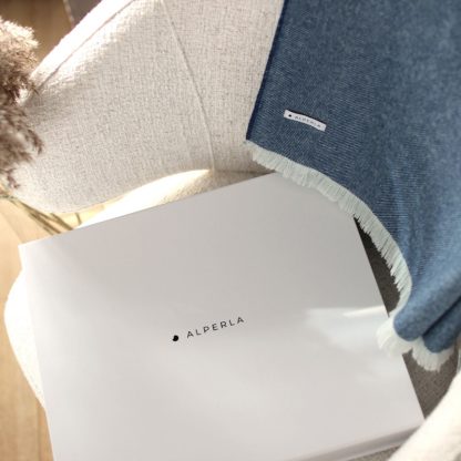 Blue alpaca blanket in an elegant giftbox