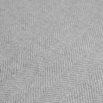 Grey herringbone pattern on alpaca blanket
