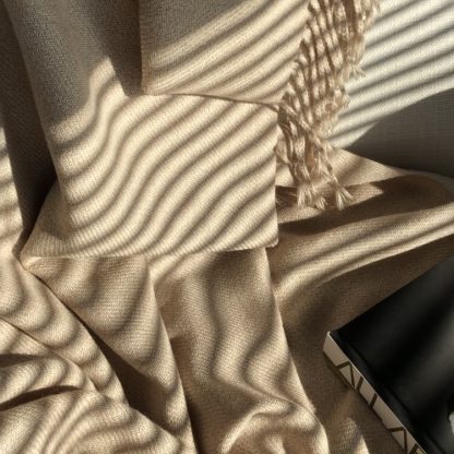 Sand alpaca blanket in the sunshine