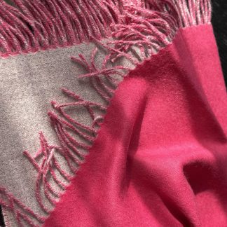 Two-color alpaca blanket in fuchsia and light melange